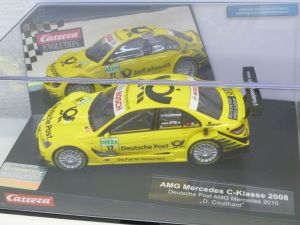 <b>Carrera Evolution 280948</b><br>Digital nachrüstbar<br>AMG Mercedes C-Klasse 2008<br>Deutsche Post AMG Mercedes 2010<br>D. Coulthard<br><br><br>Zustand: NEU<br>Preis: 30,00 Euro<br><br><b><b><font color=#cc0000>VERKAUFT</font></b></b><br>